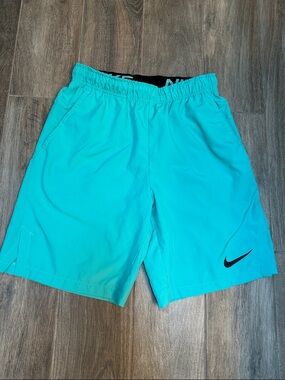 Nike Turquoise Athletic Shorts with Black Swoosh